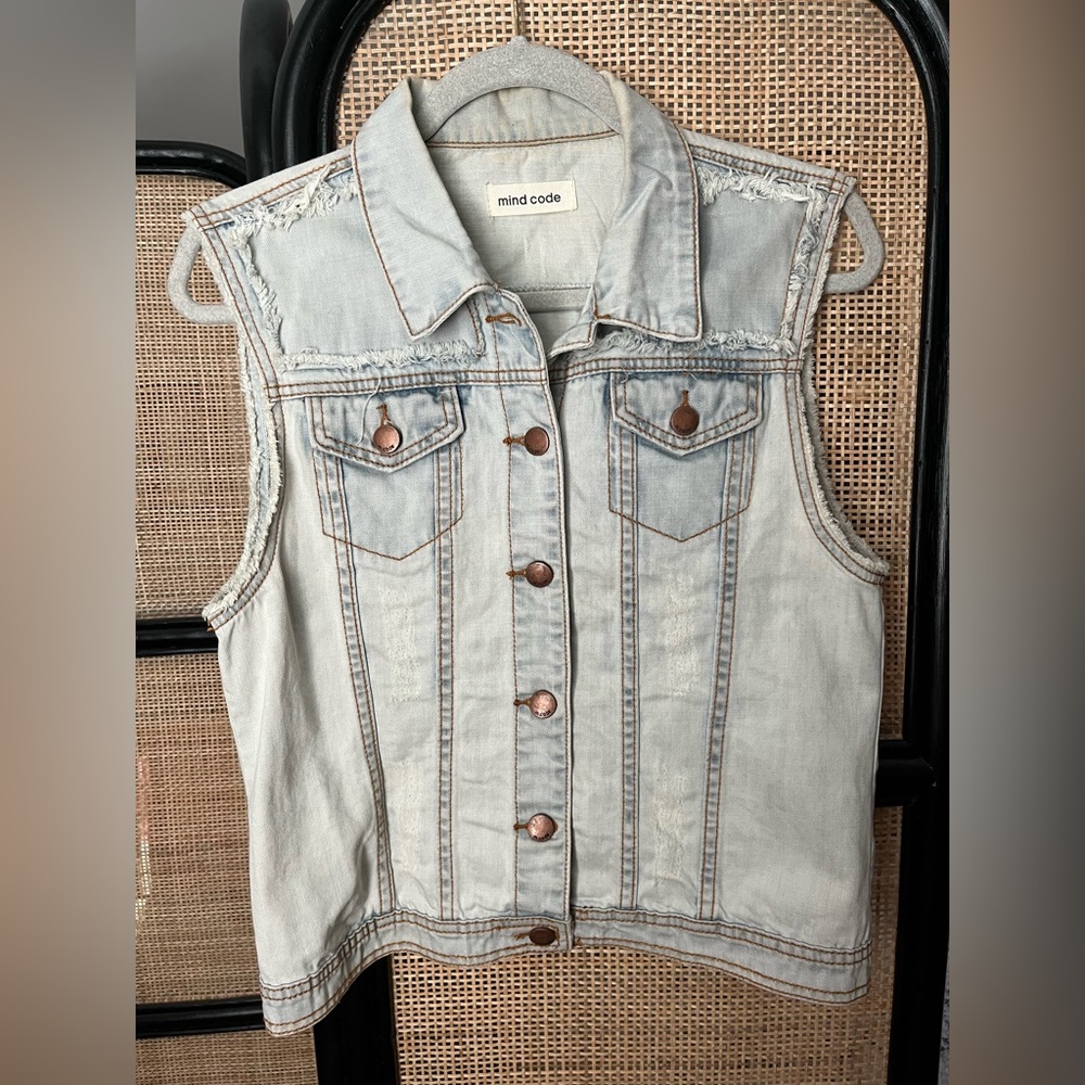 Distressed denim vest